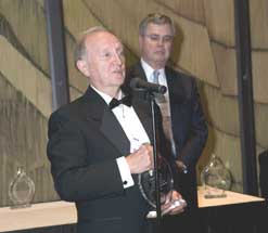 photo of Dr. Yura accepting award