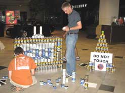kids working on project made from cans